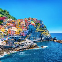 Village on cliff rocks and sea at sunset., Seascape in Five lands, Cinque Terre National Park, Liguria Italy Europe.