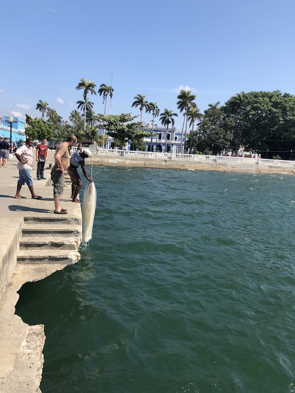 Fishing off an old pier in Cienfuegos