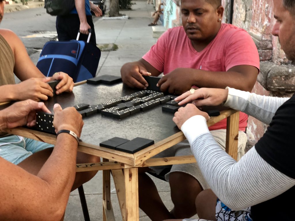 Playing Dominoes on a street corner in Cienfuegos, cuba